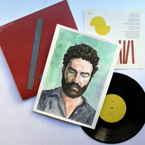 Retrato en acuarela de Jero Romero fotografiado junto a su vinilo